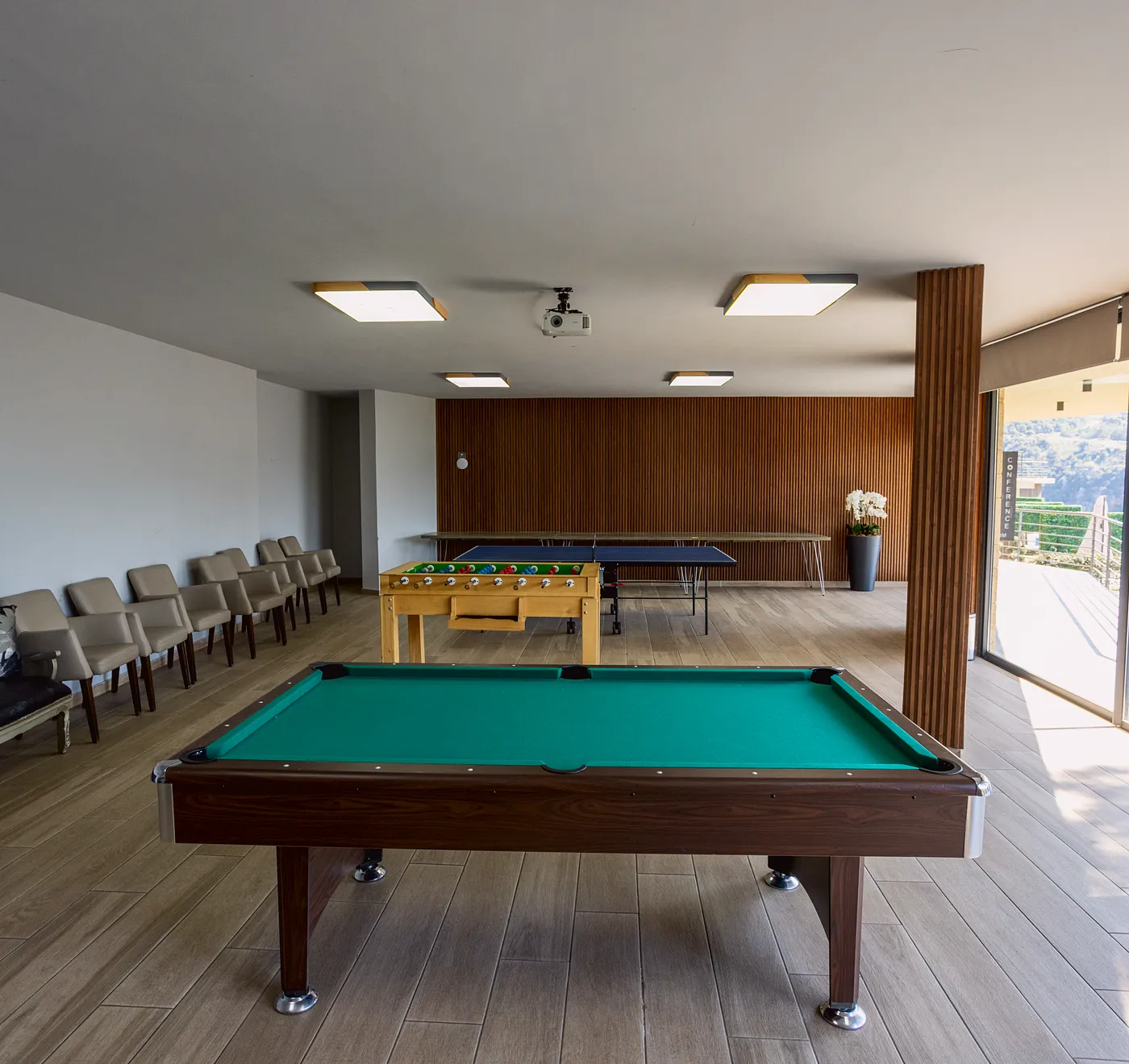 Scappa game room with pool table, foosball and table tennis