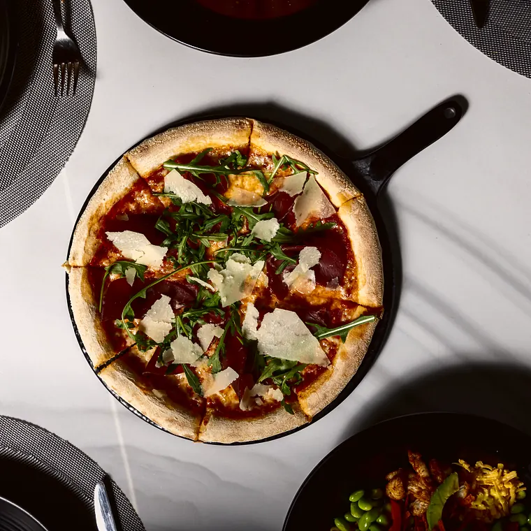 Bresaola and rocket pizza