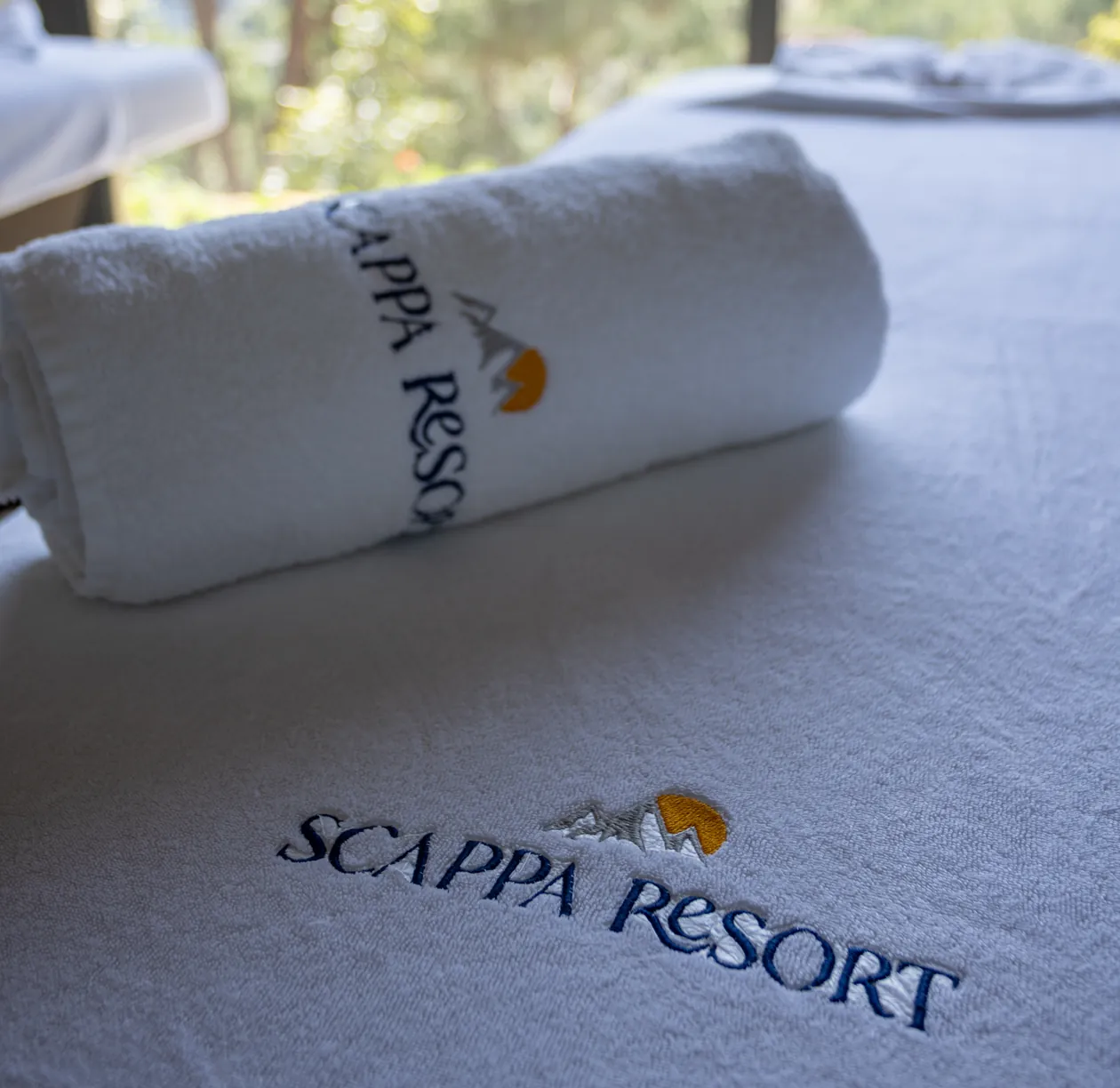 Scappa Resort towel rolled on a massage bed at the spa
